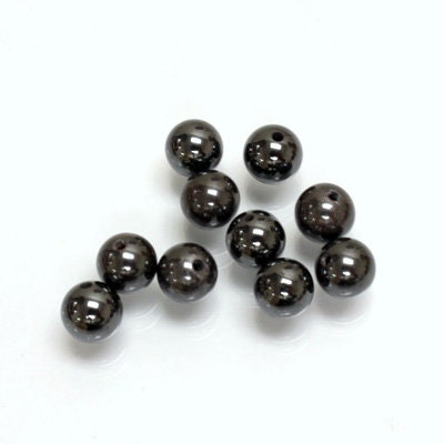 Half drilled natural Hematite beads, sold by the pair